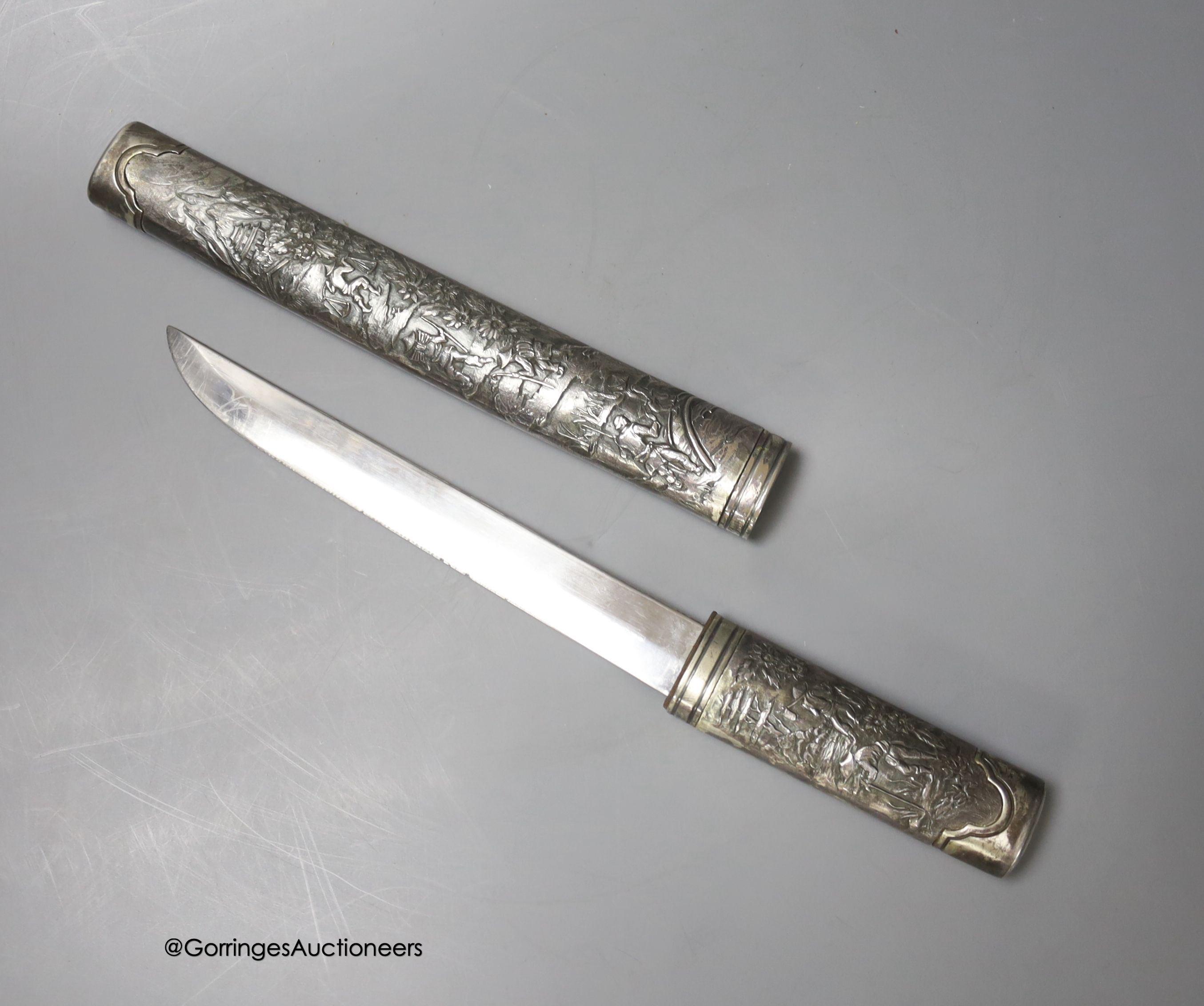 A Japanese short sword within embossed scabbard, blade 19cm